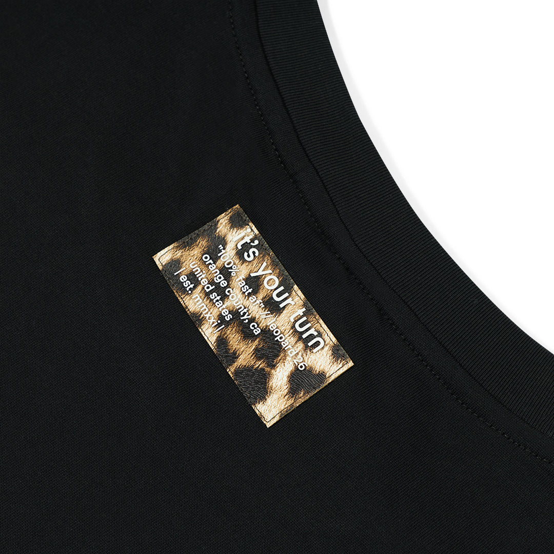 spotted black shirt